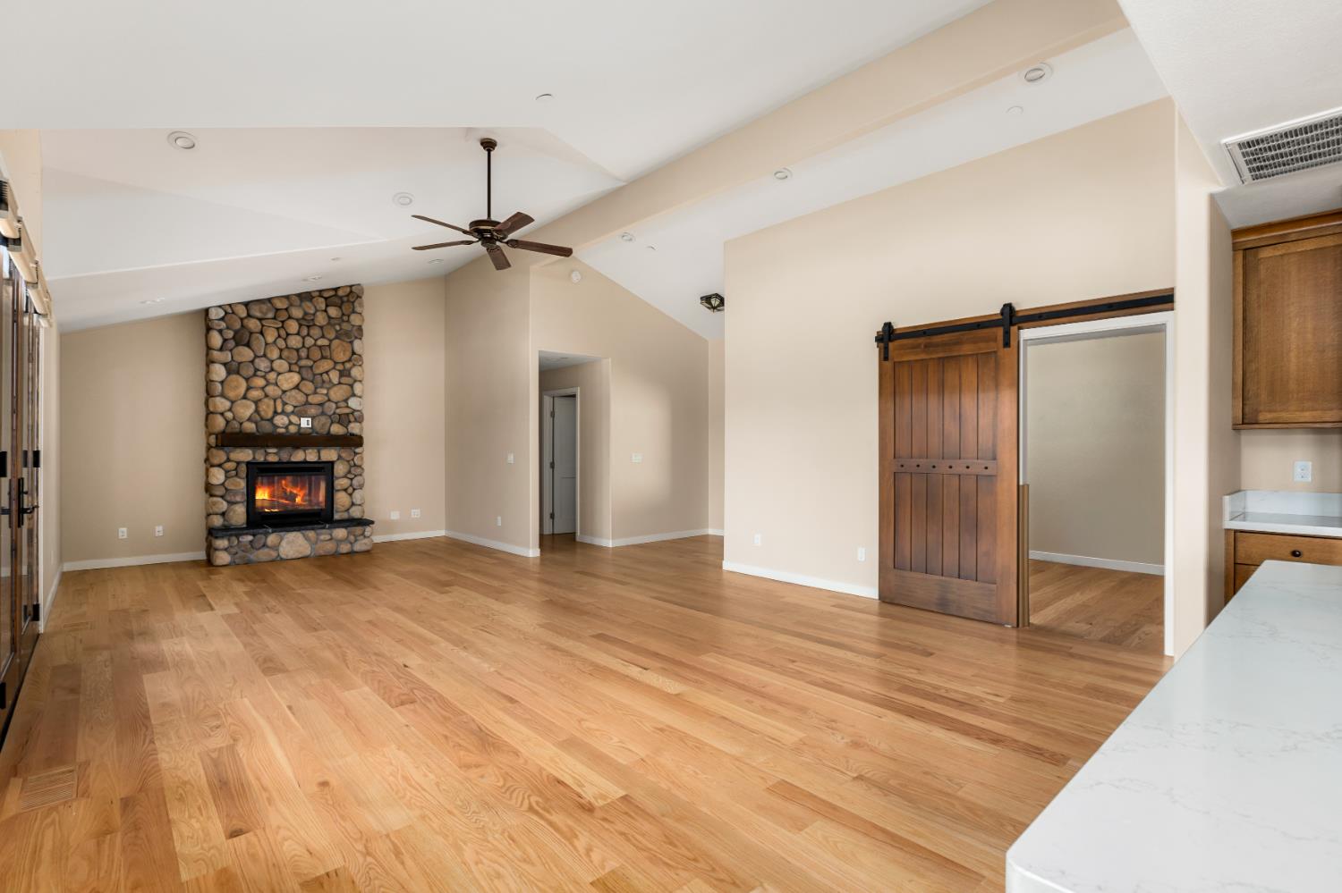 13859 Ginger Loop Penn Valley, CA 95946 - Photo 24 of 50 a view of empty room with wooden floor and a ceiling fan