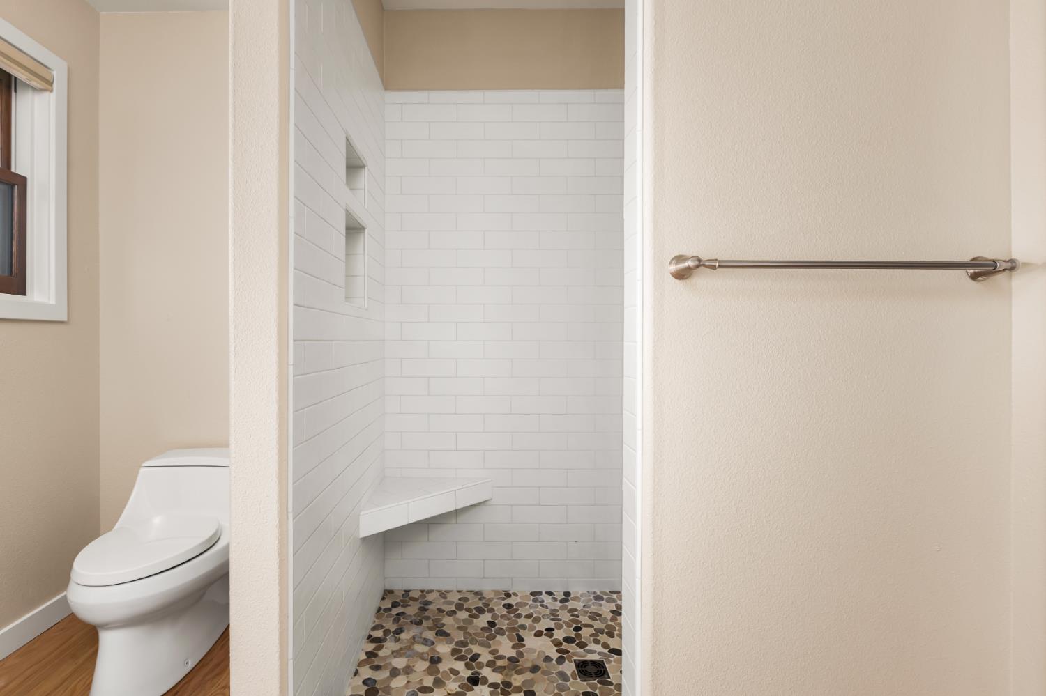 13859 Ginger Loop Penn Valley, CA 95946 - Photo 31 of 50 a bathroom with a toilet and a shower