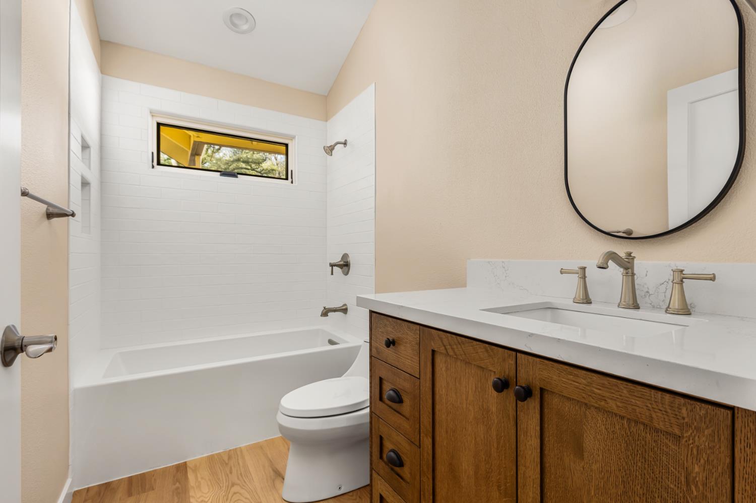 13859 Ginger Loop Penn Valley, CA 95946 - Photo 34 of 50 a bathroom with a granite countertop sink mirror vanity and toilet