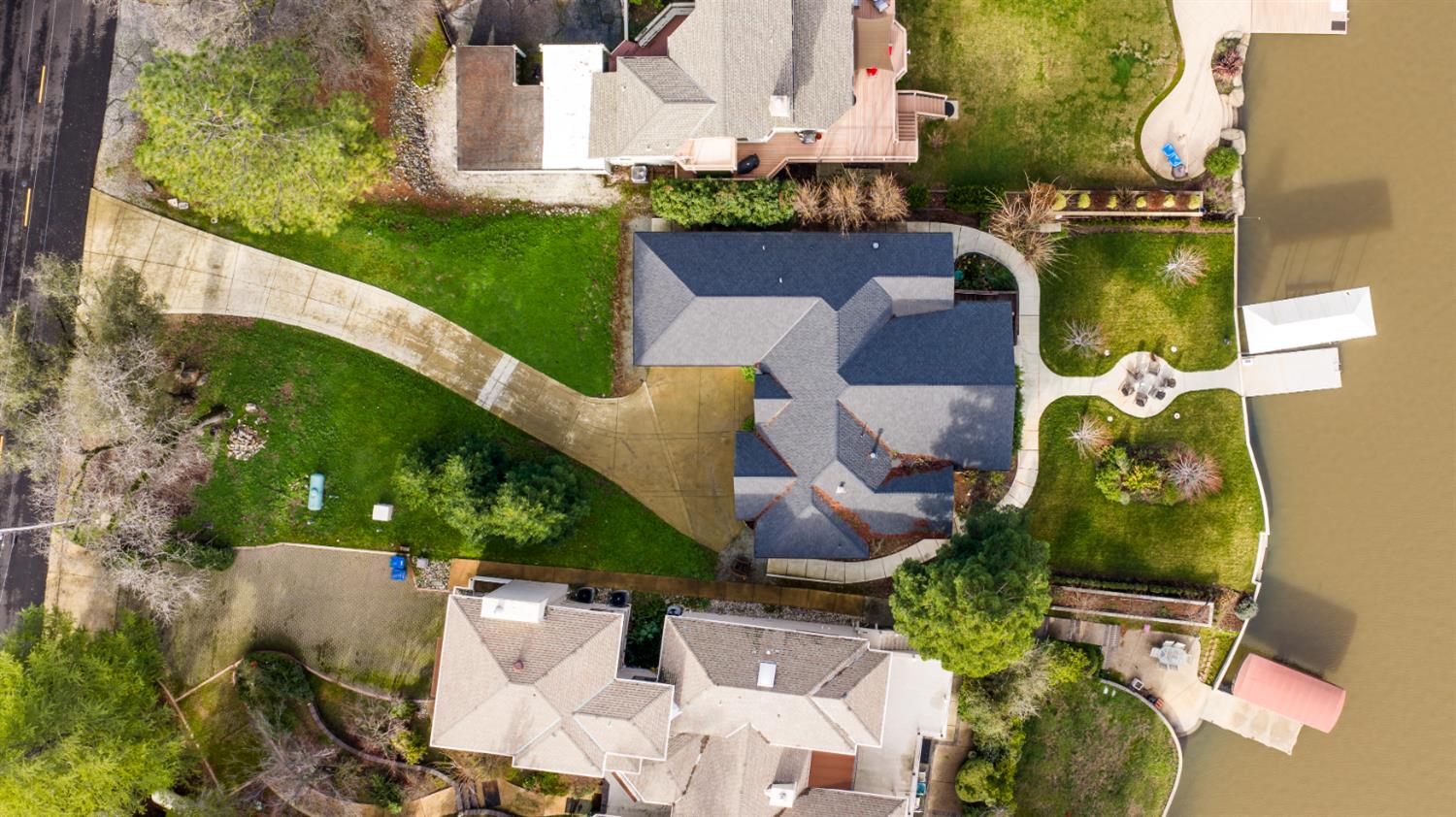 13859 Ginger Loop Penn Valley, CA 95946 - Photo 42 of 50 an aerial view of a house with a garden and large trees