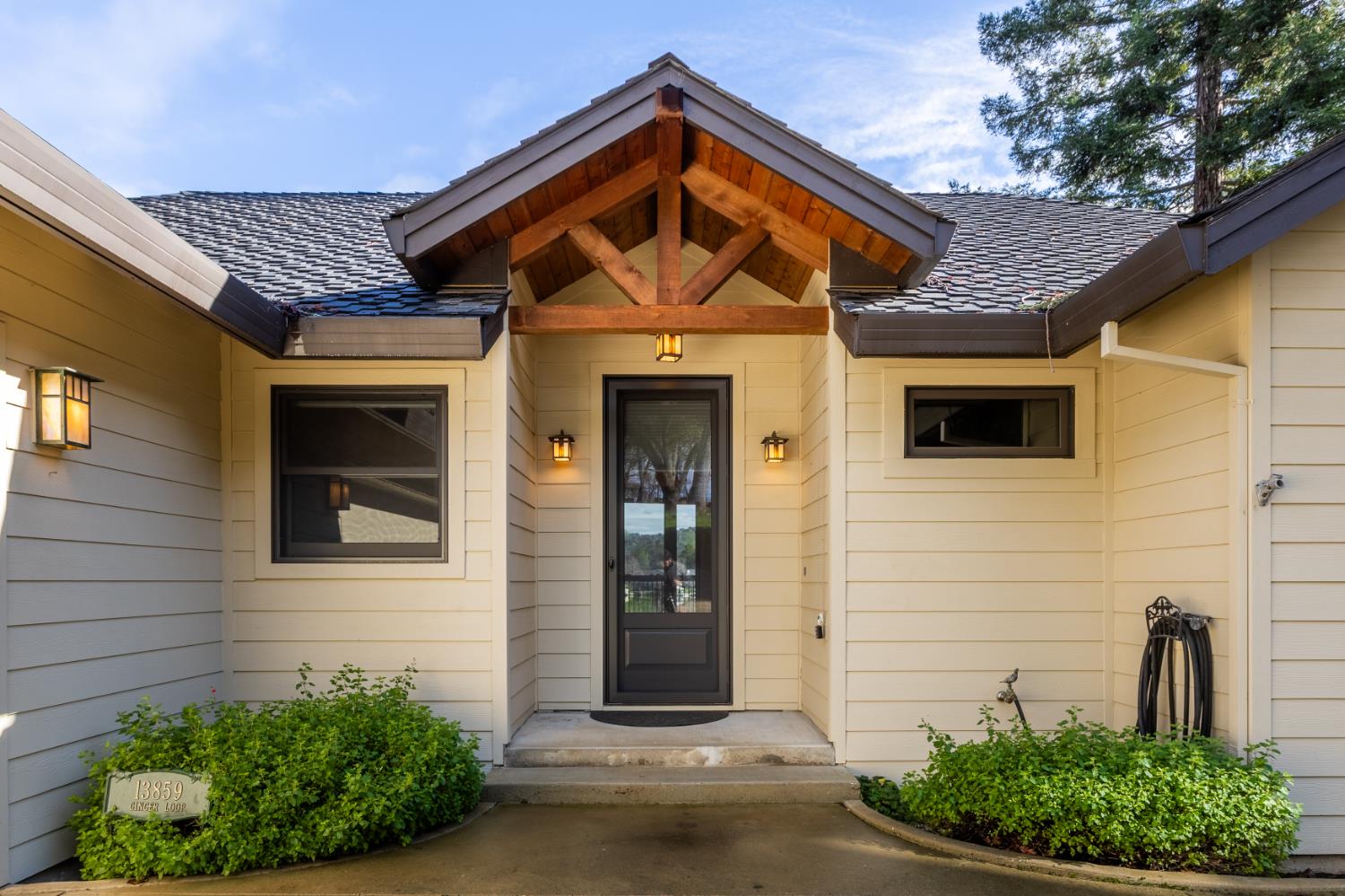 13859 Ginger Loop Penn Valley, CA 95946 - Photo 5 of 50 a front view of a house with garden