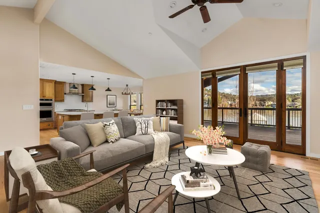 a living room with furniture and a table