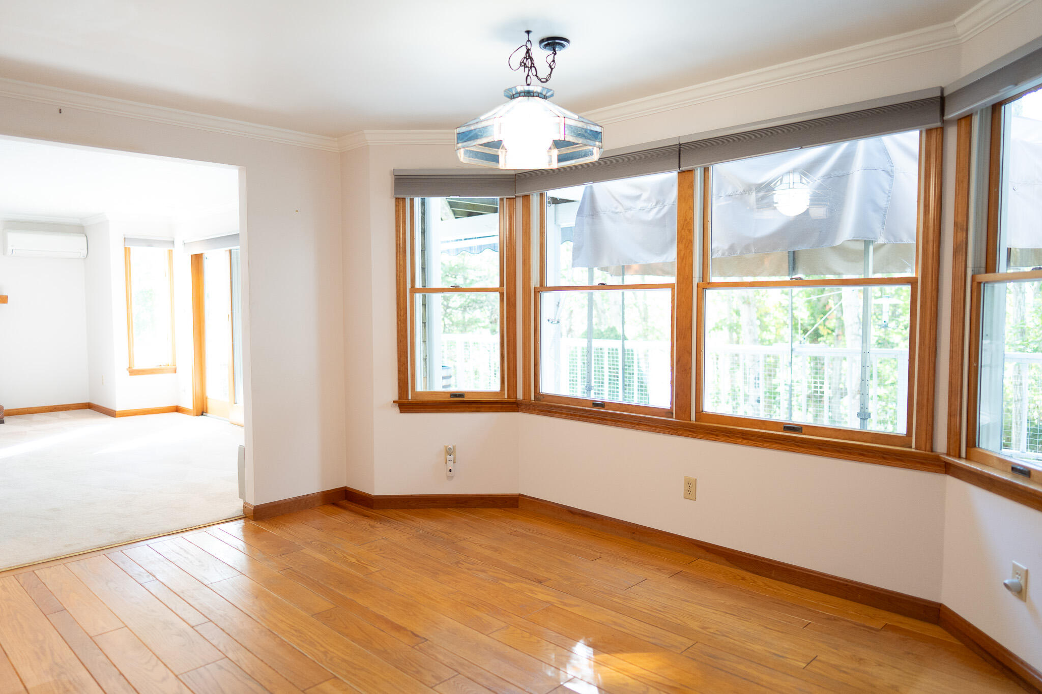 20 Kittiwake Lane Eastham, MA 02642 - Photo 22 of 75 an empty room with wooden floor and windows