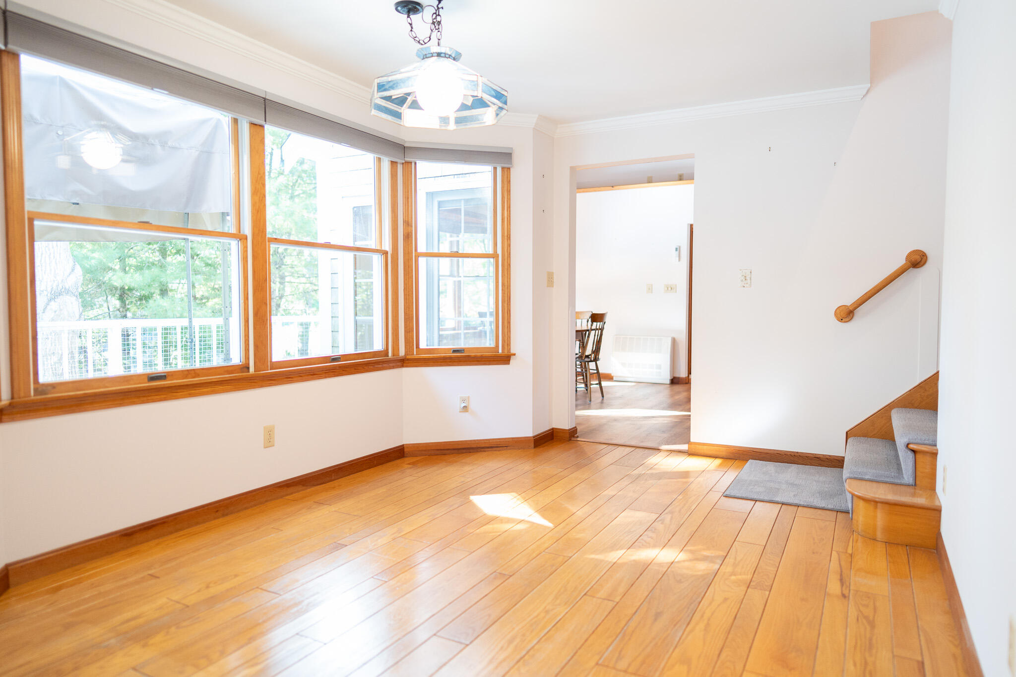 20 Kittiwake Lane Eastham, MA 02642 - Photo 23 of 75 a view of an empty room with a window and wooden floor