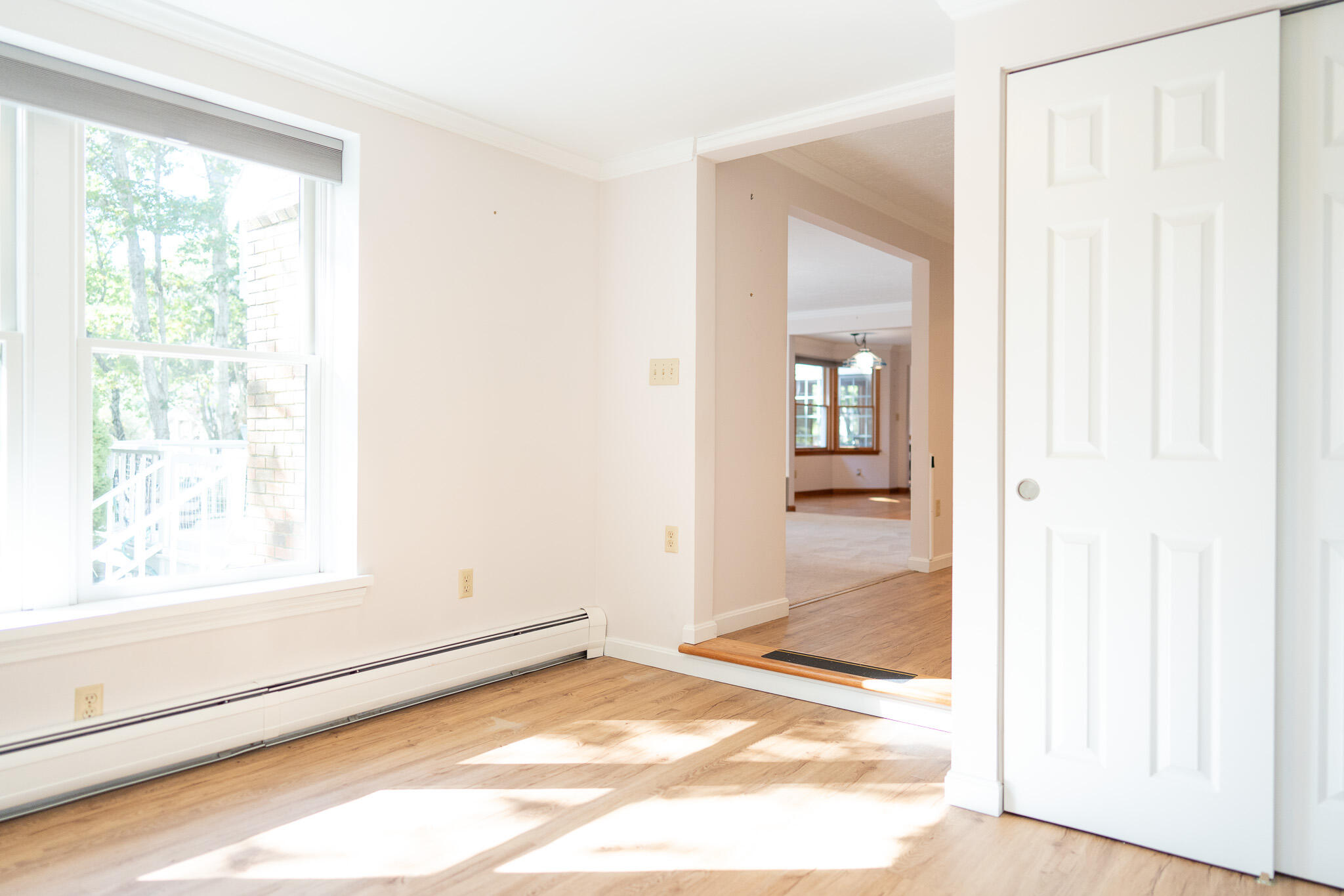 20 Kittiwake Lane Eastham, MA 02642 - Photo 29 of 75 a view of a hallway with wooden floor and a bathroom