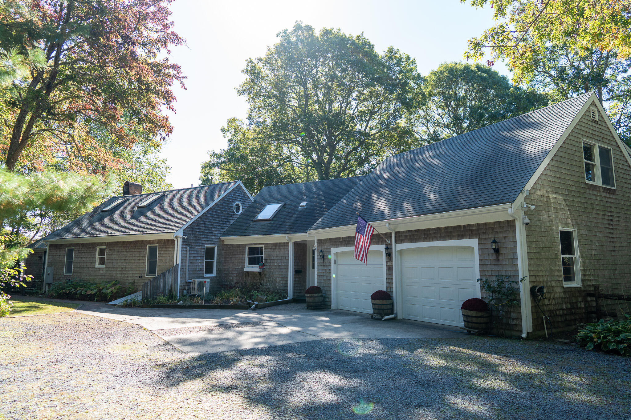 20 Kittiwake Lane Eastham, MA 02642 - Photo 4 of 75 a view of a house with a yard and large tree