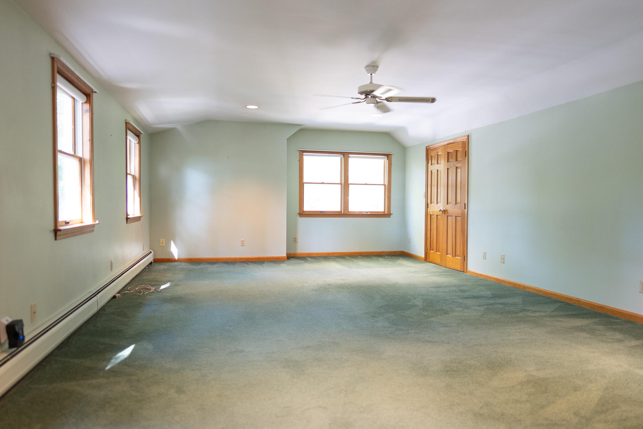 20 Kittiwake Lane Eastham, MA 02642 - Photo 48 of 75 an empty room with windows and chandelier fan