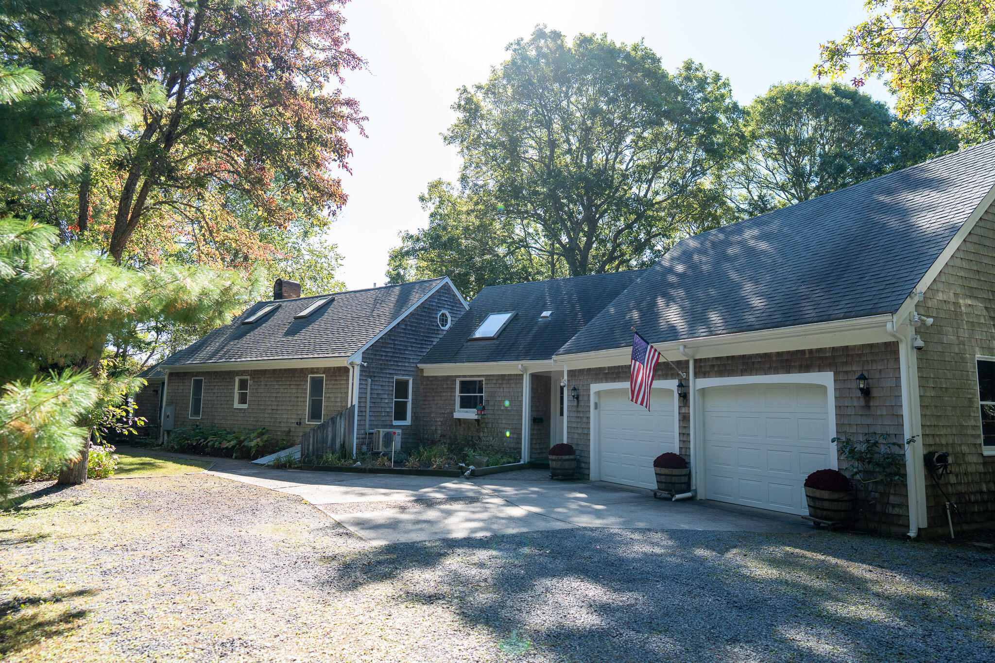 20 Kittiwake Lane Eastham, MA 02642 - Photo 68 of 75 a view of a house with a yard and large tree