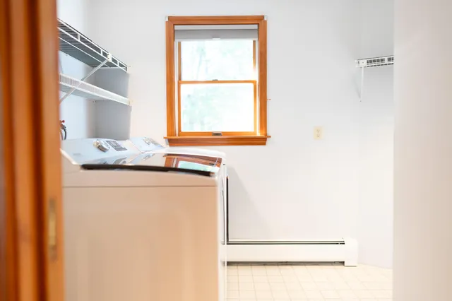 a kitchen with stainless steel appliances a sink and a refrigerator