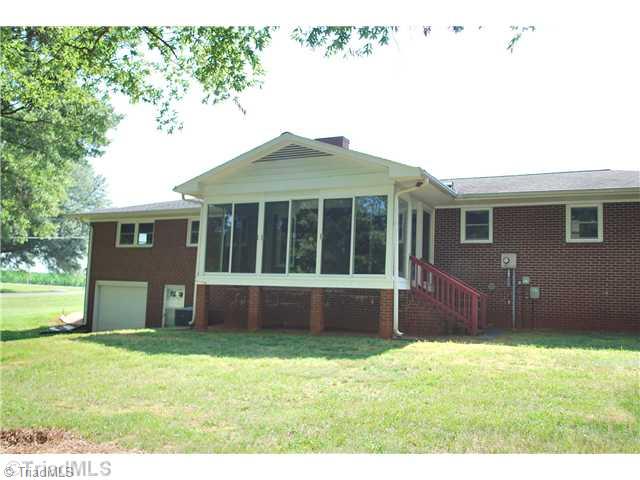 155 Madison Road Mocksville, NC 27028 - Photo 1 of 10 Exterior Back. Enjoy the outside from the inside in this 17x11 sunroom