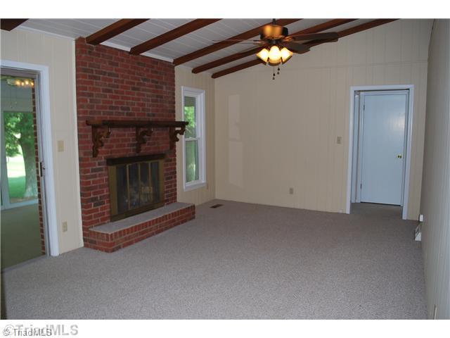 155 Madison Road Mocksville, NC 27028 - Photo 5 of 10 Den/Family/Great Room. Den just off of the kitchen that connects to the sunroom