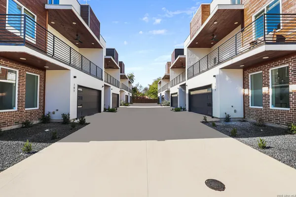 a view of a street with buildings