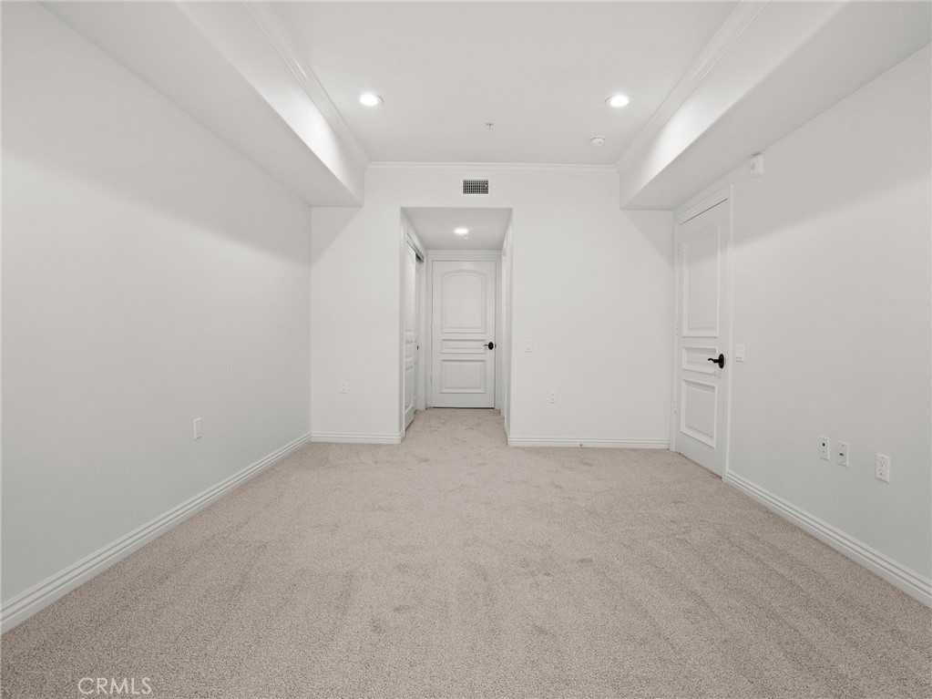 1598 Long Beach, Unit 214 Long Beach, CA 90813 - Photo 14 of 30 an empty room with white wall and natural light