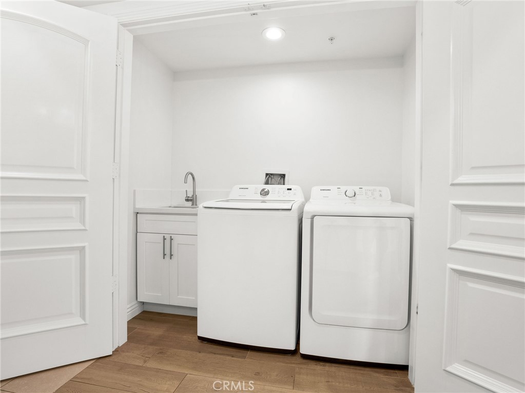 1598 Long Beach, Unit 214 Long Beach, CA 90813 - Photo 22 of 30 a utility room with dryer and washer