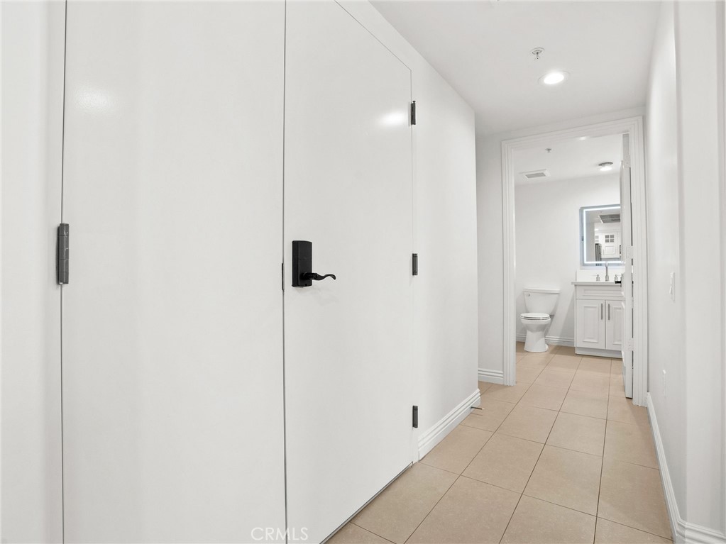 1598 Long Beach, Unit 214 Long Beach, CA 90813 - Photo 24 of 30 a bathroom with a shower and a toilet