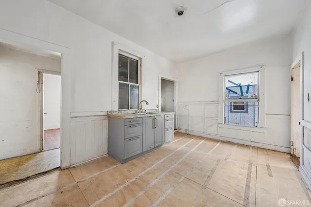 a view of a kitchen with a sink