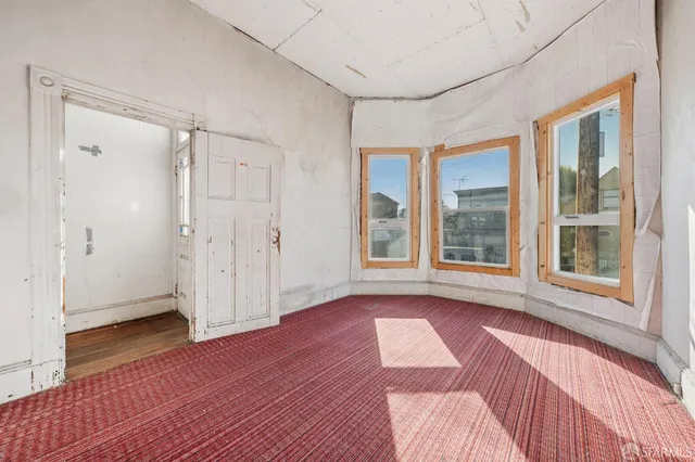 a view of livingroom with hardwood floor and window