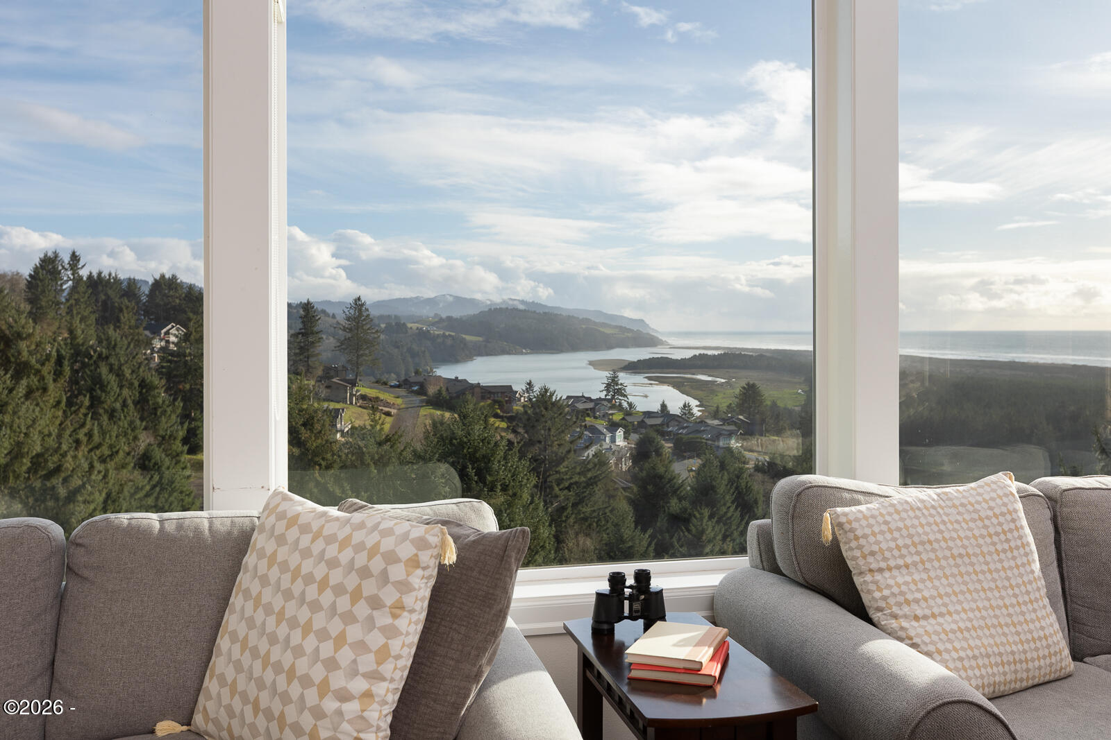 7415 East Summit Road Pacific City, OR 97135 - Photo 4 of 44 a balcony with furniture and a floor to ceiling window