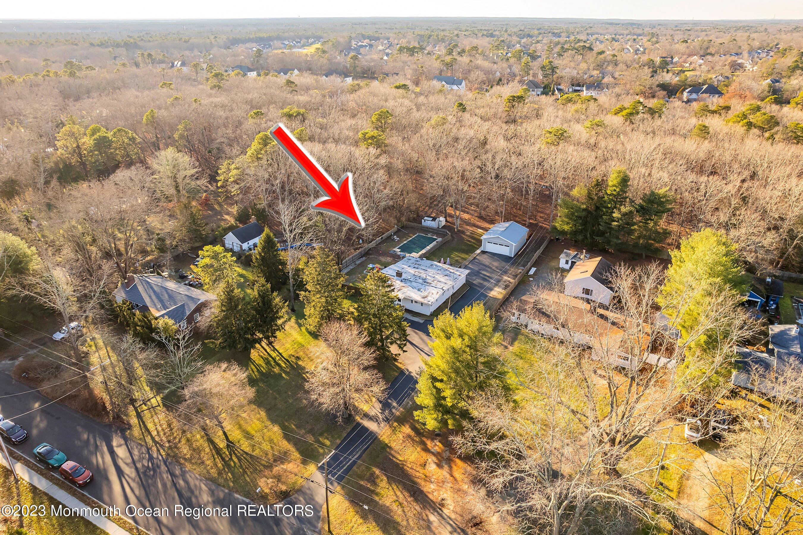 194 Sams Road Jackson, NJ 08527 - Photo 3 of 29 an aerial view of residential houses with outdoor space