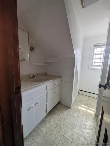 a room with window and closet