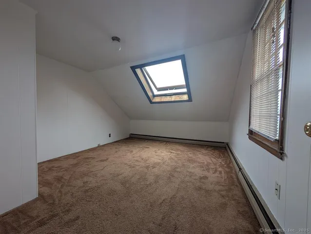 a view of empty room with windows