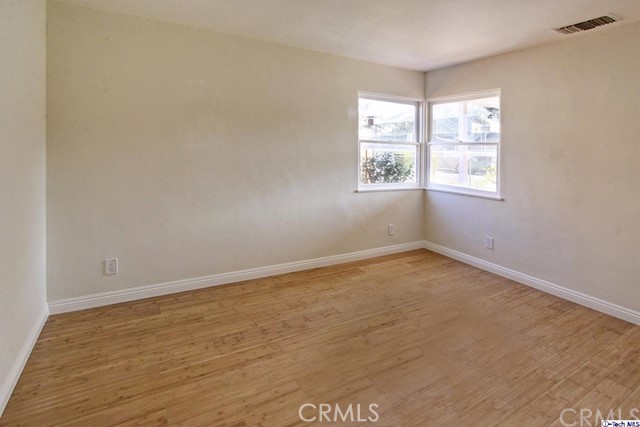 10563 Irma Avenue Tujunga, CA 91042 - Photo 14 of 25 an empty room with a window