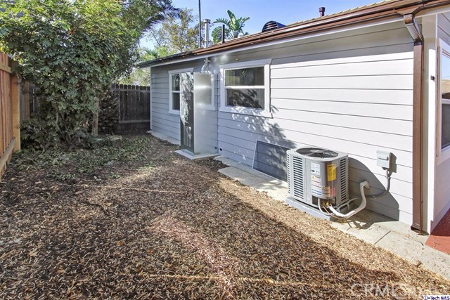 10563 Irma Avenue Tujunga, CA 91042 - Photo 24 of 25 a view of a house with a backyard