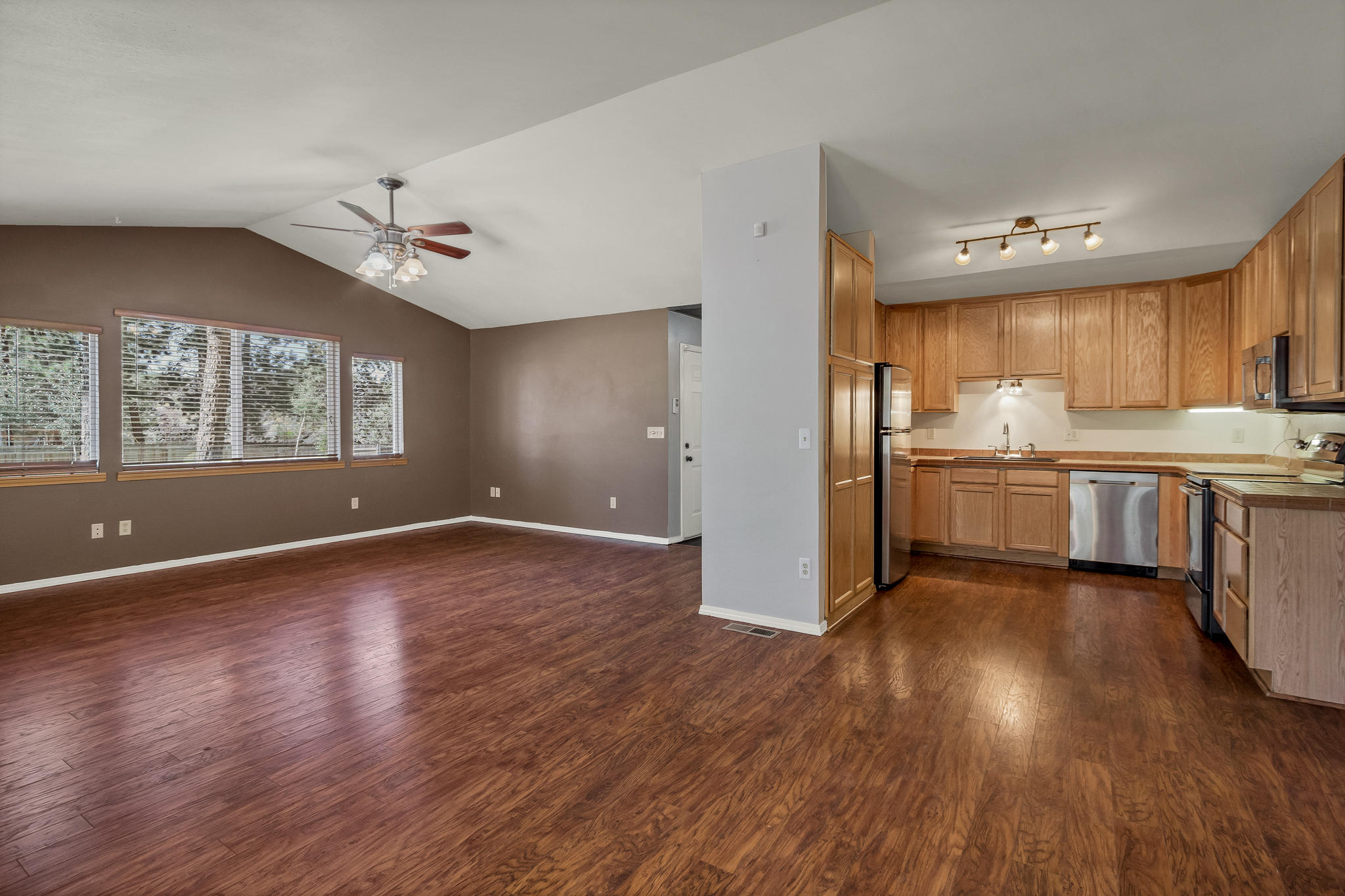 19323 Mohawk Road Bend, OR 97702 - Photo 22 of 22 wide angle of the great room and kitchen/open floor plan
