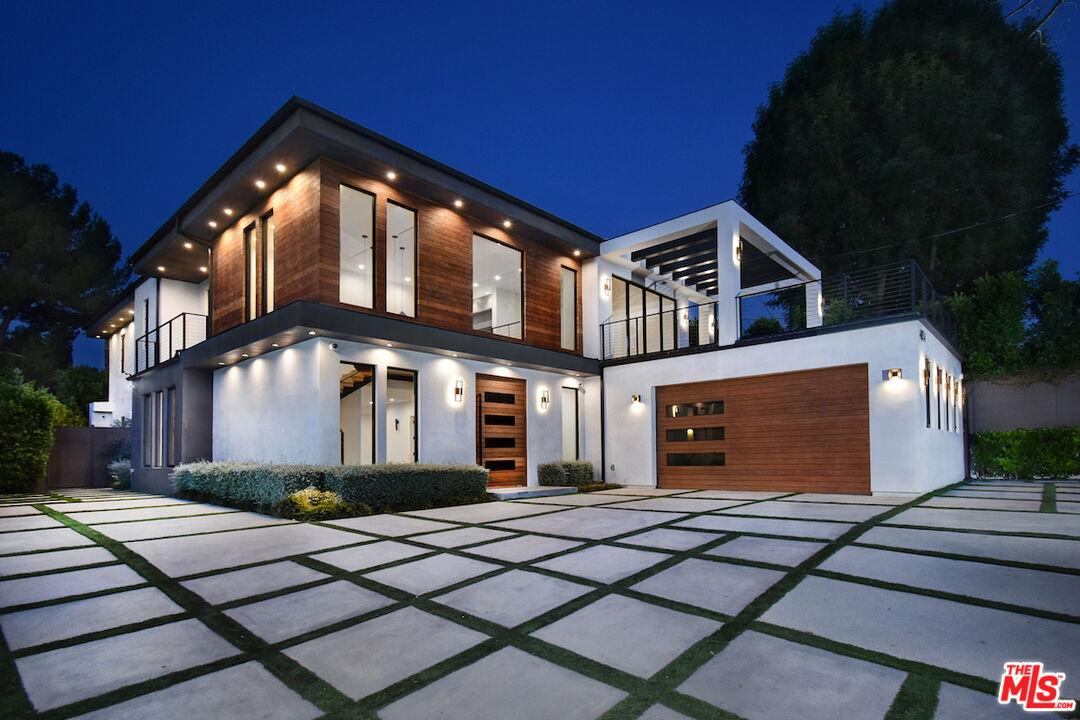 4854 Alonzo Avenue Encino, CA 91316 - Photo 1 of 53 a front view of a house