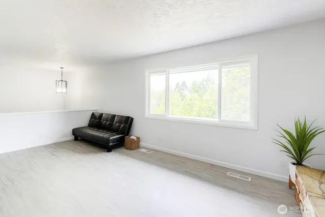 a kitchen with a refrigerator sink and microwave