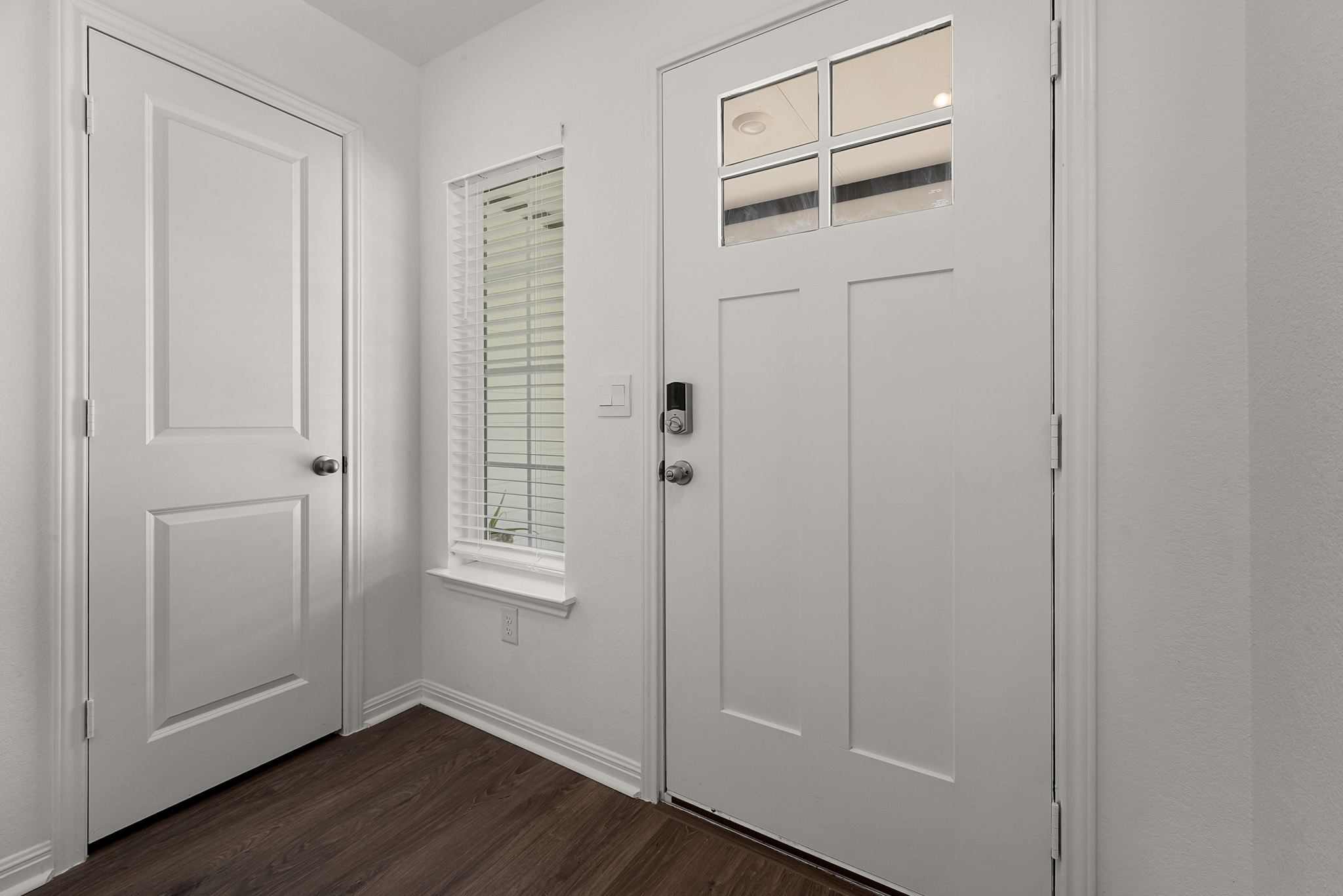 165 Santa Rosa Lane Buda, TX 78610 - Photo 3 of 21 a view of an entryway with wooden floor