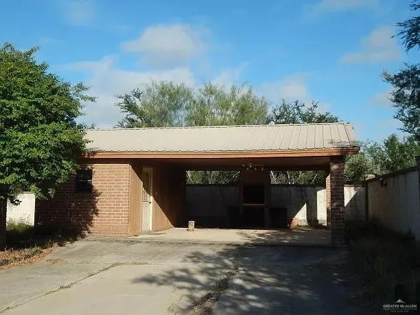 a front view of a house with yard