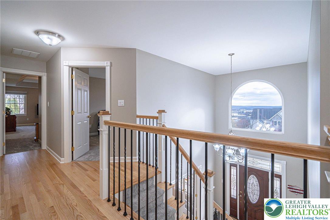 6551 Overlook Road Orefield, PA 18069 - Photo 36 of 82 a view of a hallway with wooden floor and entryway