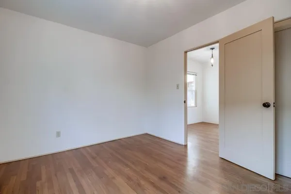 a bathroom with a shower and toilet