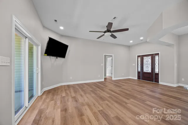 a view of a livingroom with a flat screen tv