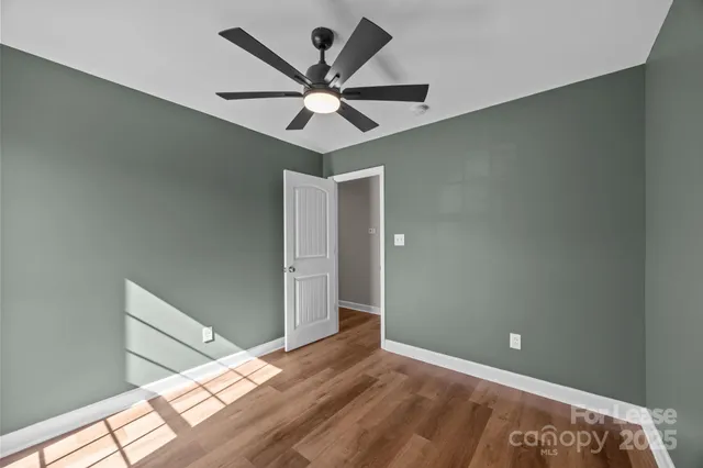 a view of a big room with wooden floor