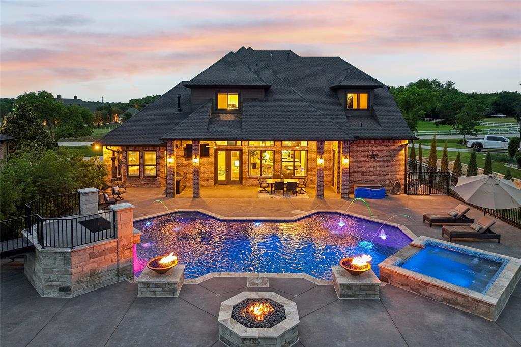 1657 Florence Road Keller, TX 76262 - Photo 2 of 40 a view of a chairs and table in the patio