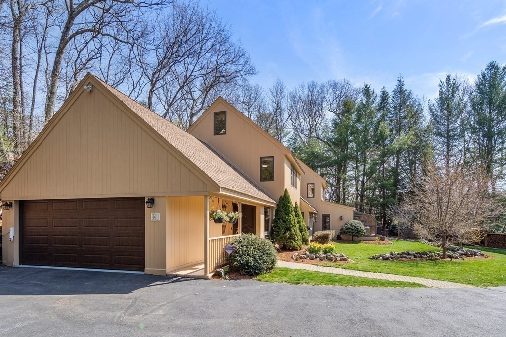 6 Crestwood Road North Reading, MA 01864 - Photo 31 of 36 a front view of a house with a yard and garage
