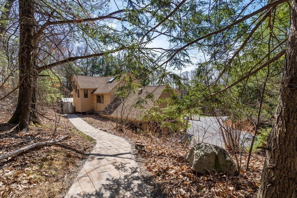 6 Crestwood Road North Reading, MA 01864 - Photo 32 of 36 a view of a backyard of the house