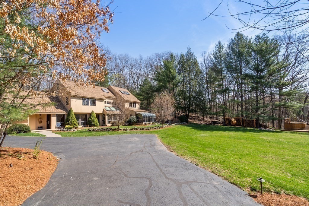 6 Crestwood Road North Reading, MA 01864 - Photo 35 of 36 a view of a big house with a big yard and large trees