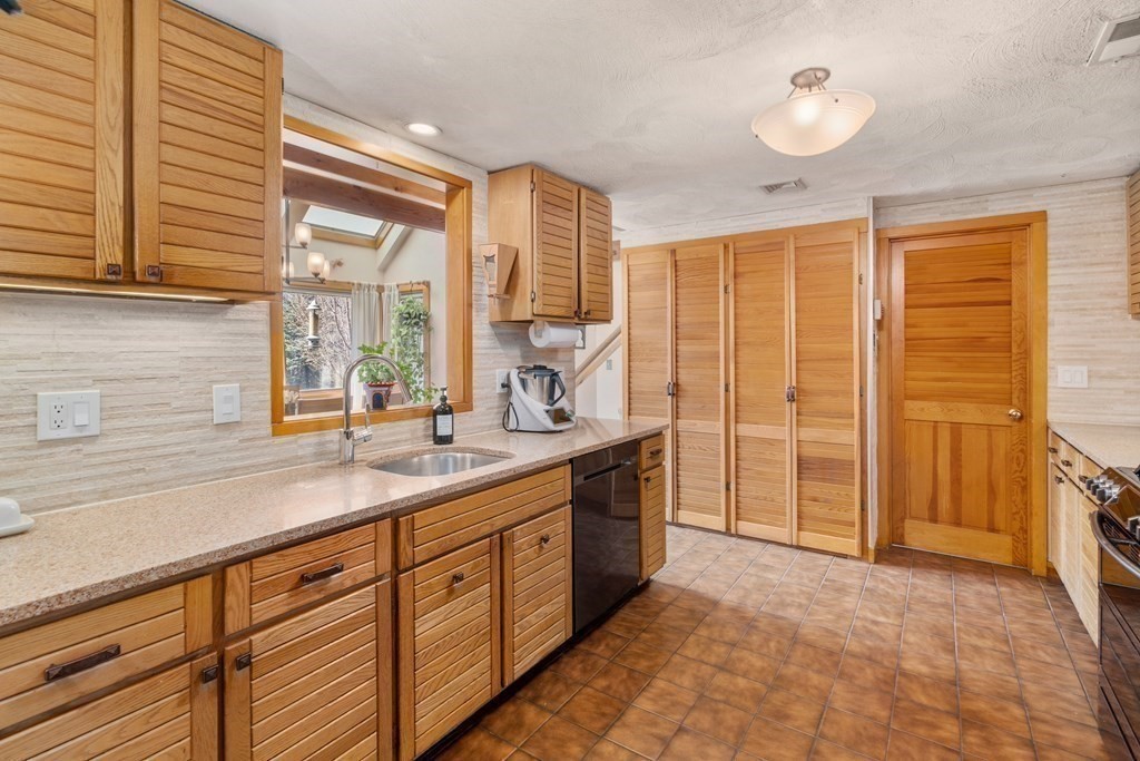 6 Crestwood Road North Reading, MA 01864 - Photo 5 of 36 a spacious bathroom with a granite countertop sink mirror and a shower