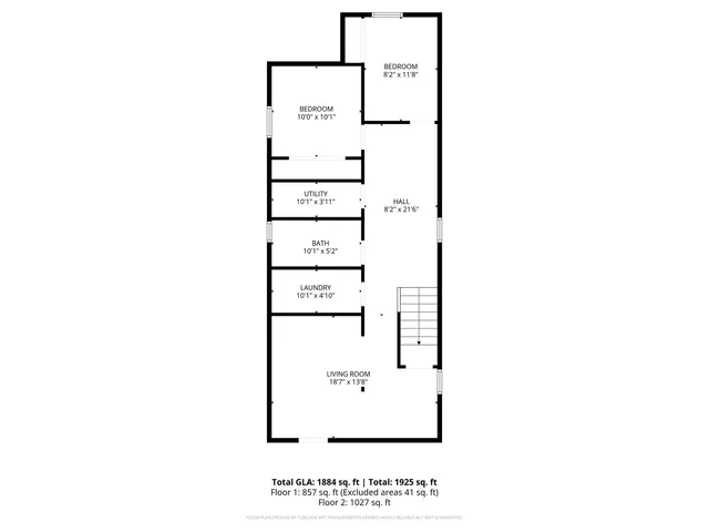 a picture of a bench in front of building