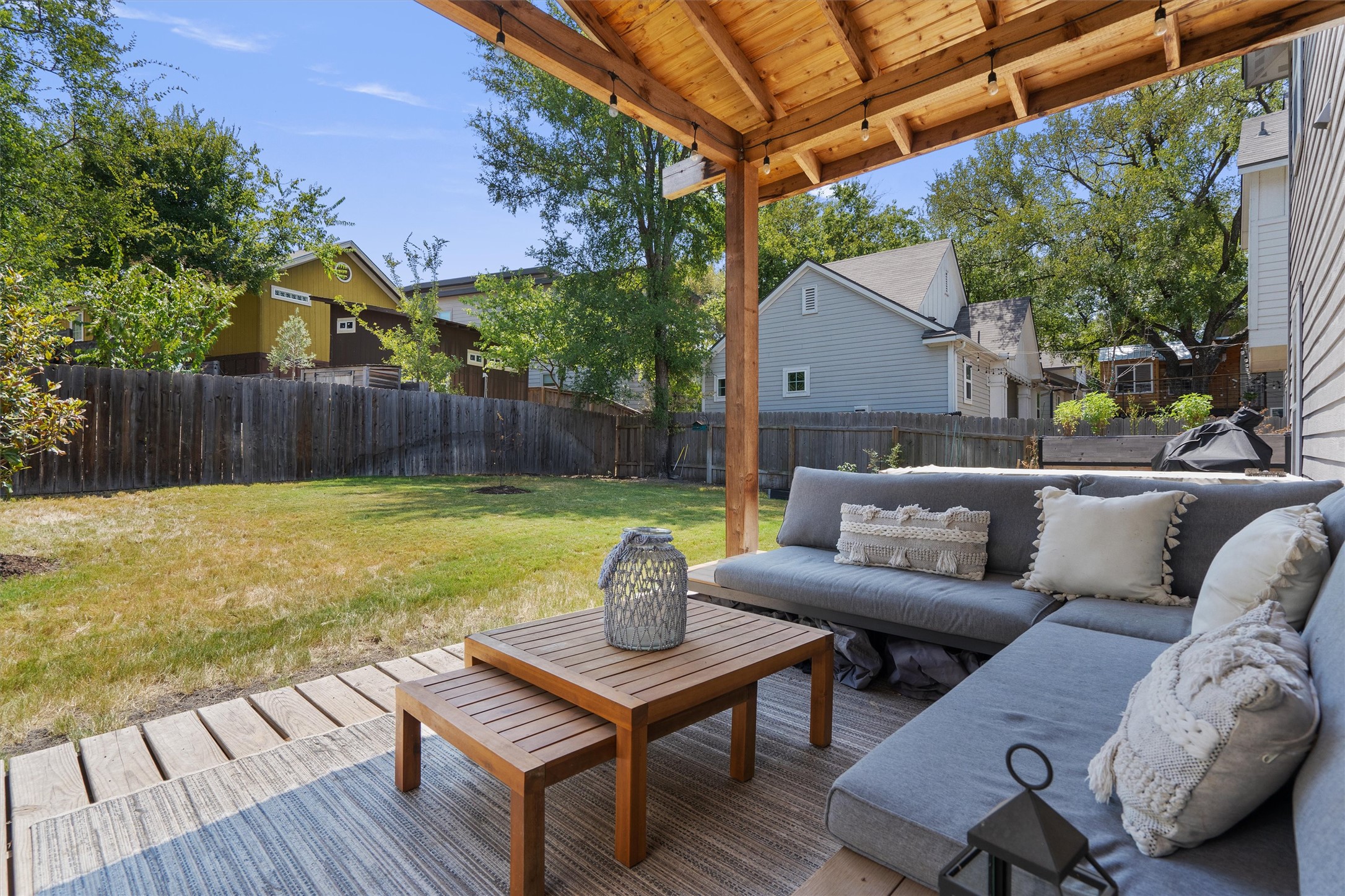 1309 Fort Branch Boulevard Austin, TX 78721 - Photo 17 of 19 a view of a patio with couches chairs and a fire pit