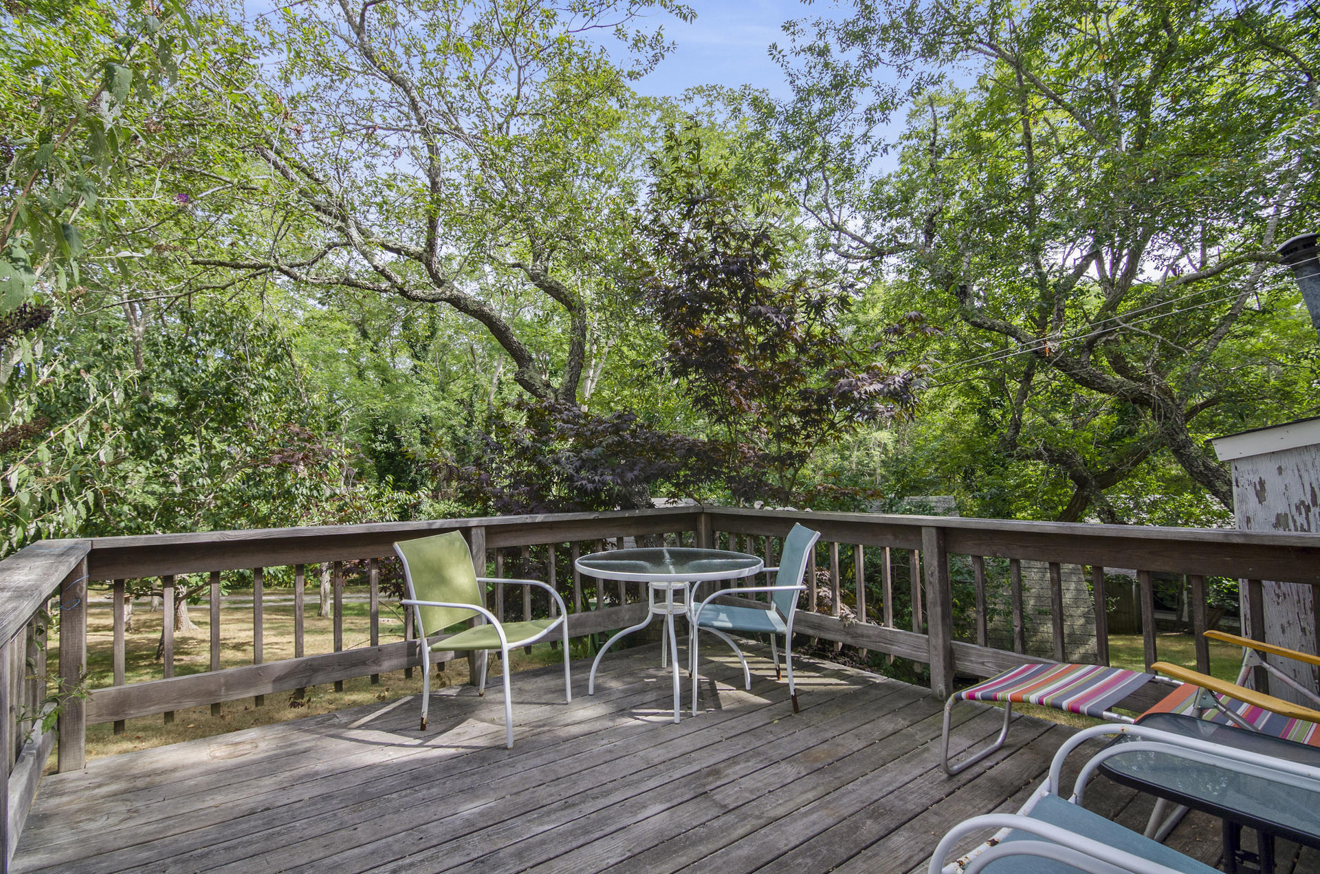 215 Pilgrim Spring Road, Unit 4 Wellfleet, MA 02667 - Photo 19 of 28 a view of roof deck with patio and wooden floor