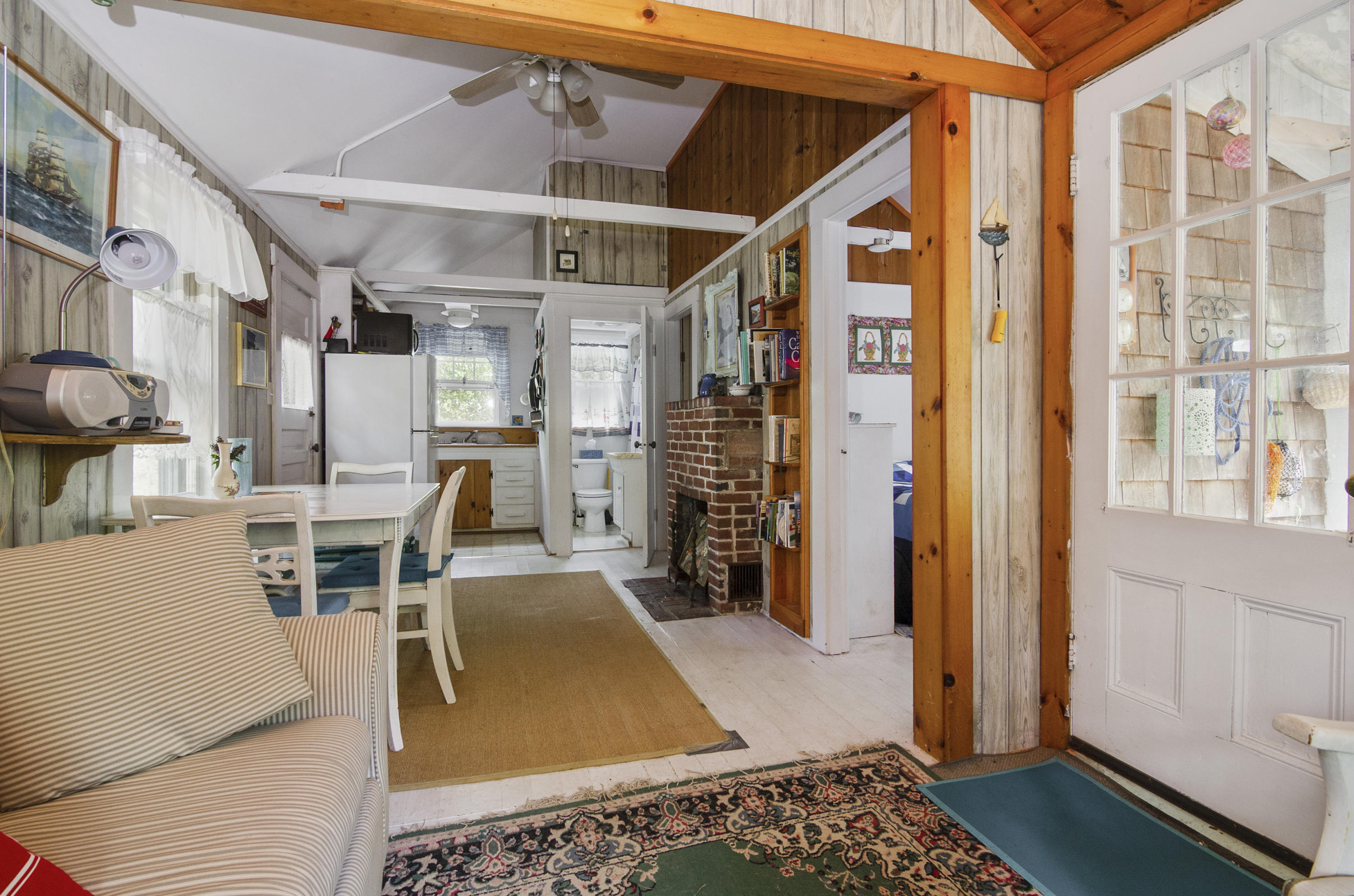 215 Pilgrim Spring Road, Unit 4 Wellfleet, MA 02667 - Photo 7 of 28 a view of a livingroom with furniture and a window