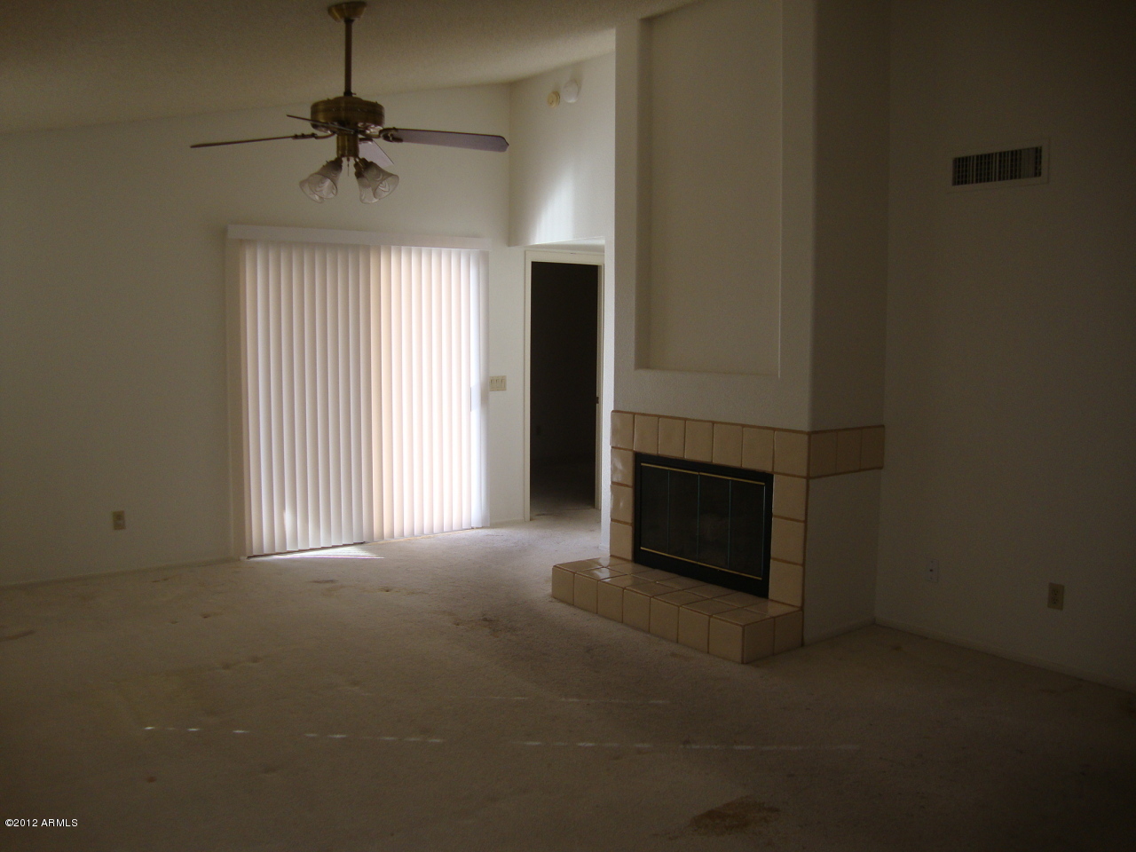 2915 East Amber Ridge Way Phoenix, AZ 85048 - Photo 14 of 17 living room with fireplace