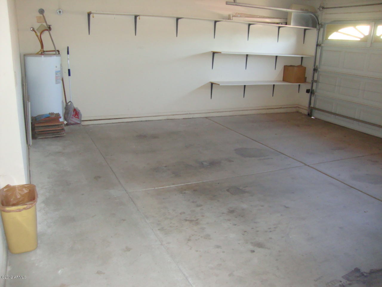 2915 East Amber Ridge Way Phoenix, AZ 85048 - Photo 17 of 17 2 car garage with shelving.