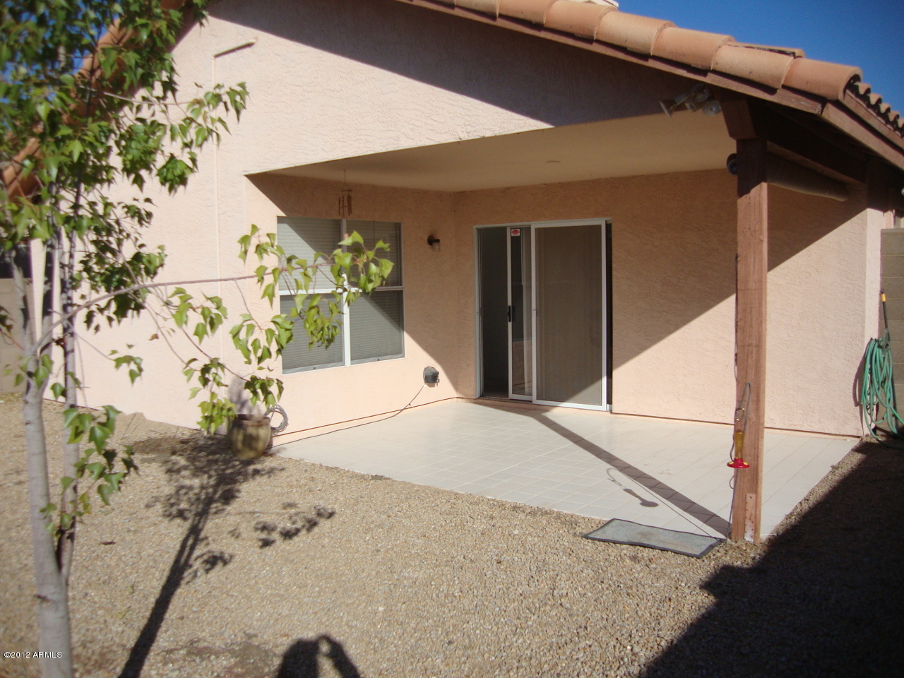 2915 East Amber Ridge Way Phoenix, AZ 85048 - Photo 9 of 17 Back patio is space and enclosed