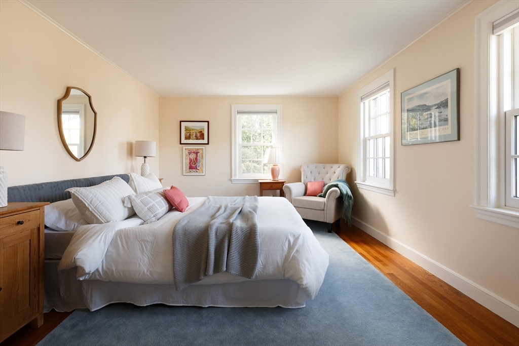 170 Reservoir Road Brookline, MA 02467 - Photo 15 of 20 a bedroom with a bed and a window