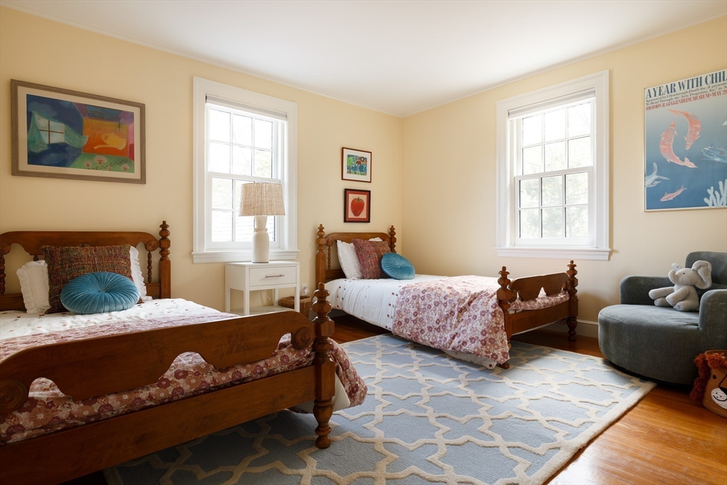 170 Reservoir Road Brookline, MA 02467 - Photo 16 of 20 a bedroom with two beds and a window